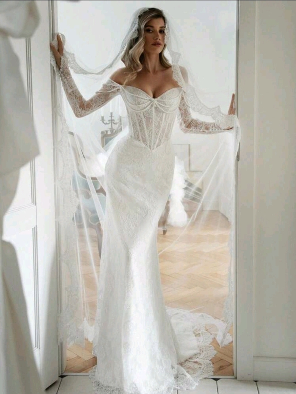 Elegant White Lace Off-Shoulder Bridal Gown with Veil